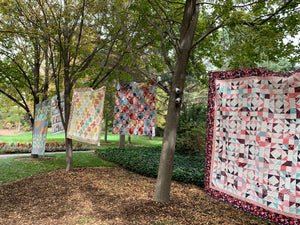 Quilts Hanging in the Trees